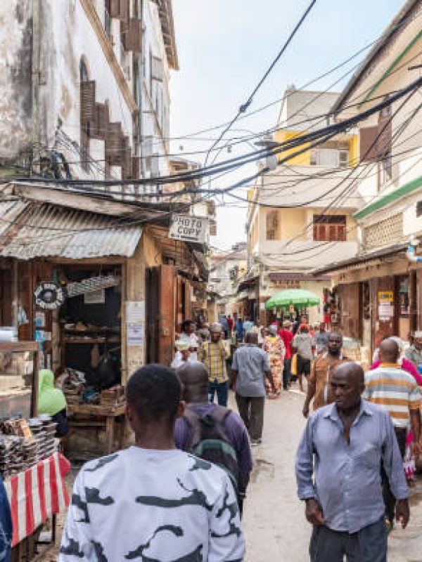 Zanzibar, Tanzania - February 21, 2019: local  people in the crowded Streets of Stone Town, Zanzibar
