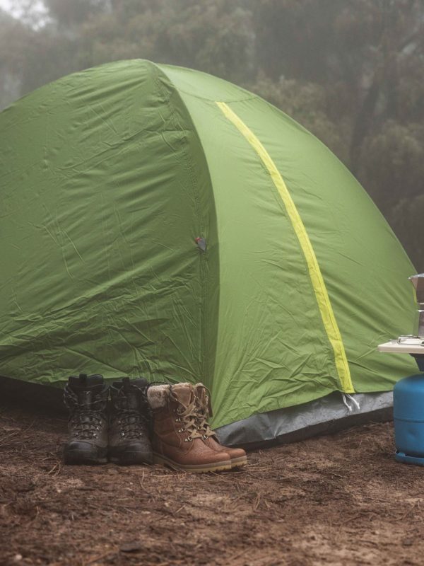 green-tent-set-up-forest